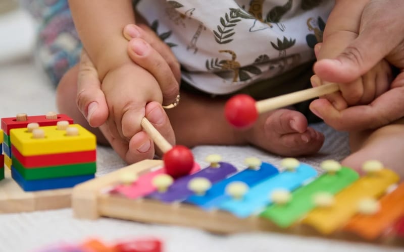 Kids enjoying music and art classes